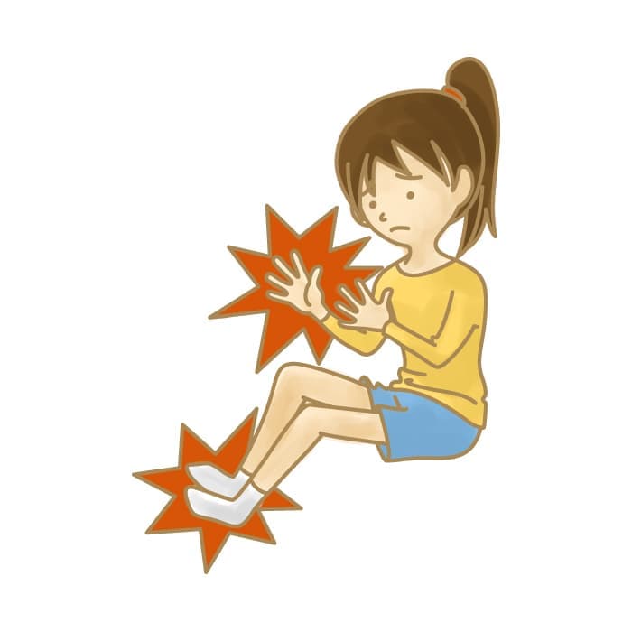 手足の痺れで悩む女性